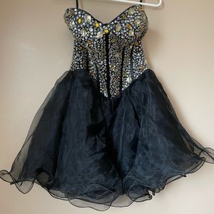 Beaded, strapless, corset over the knee dress